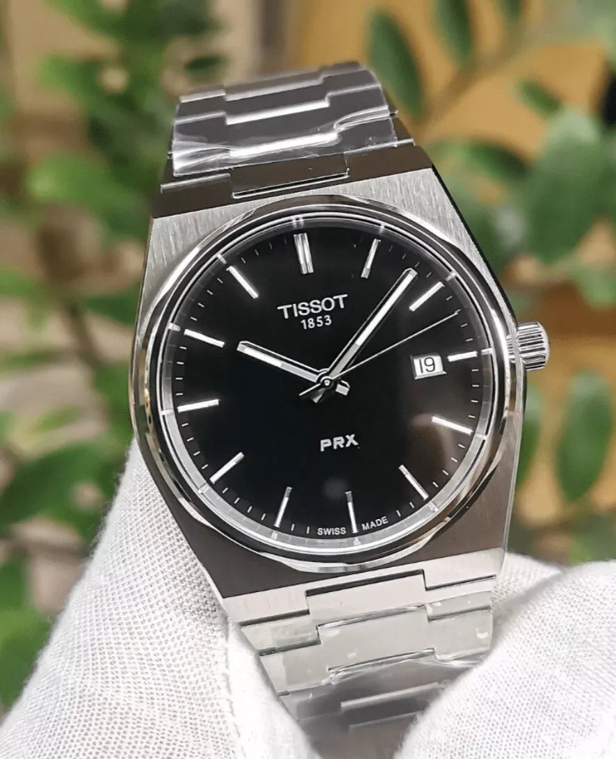 T i s s o t (PRX) quartz