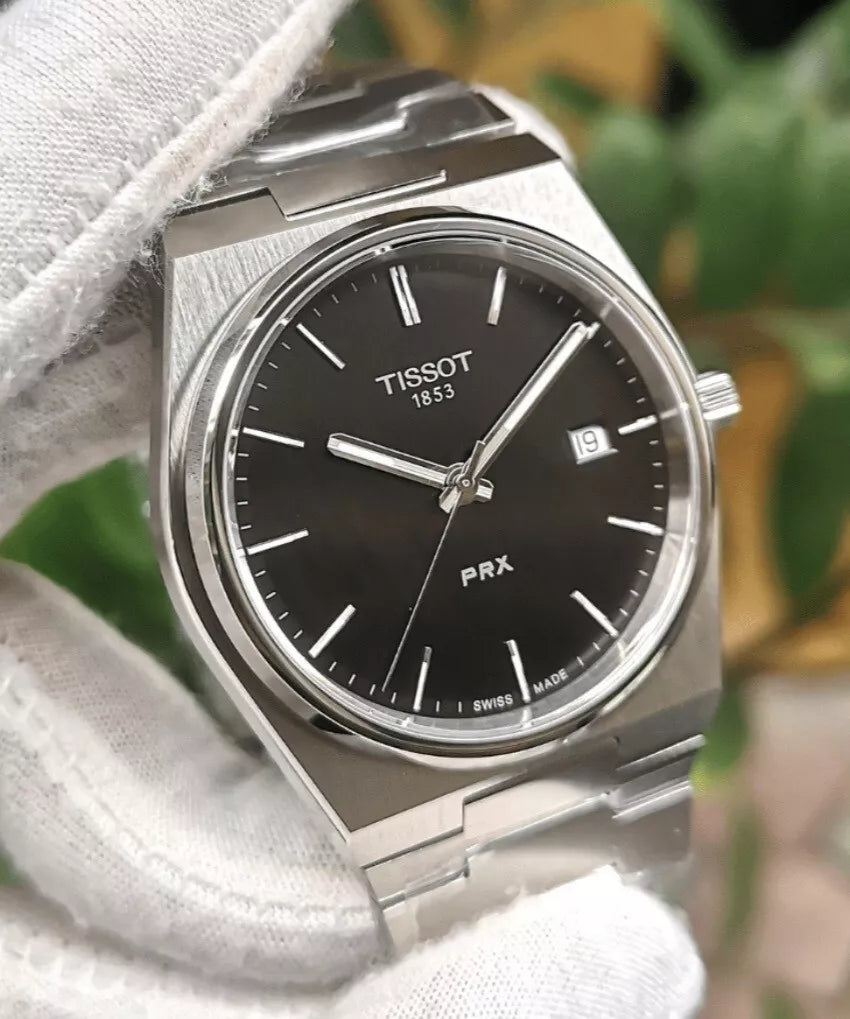 T i s s o t (PRX) quartz